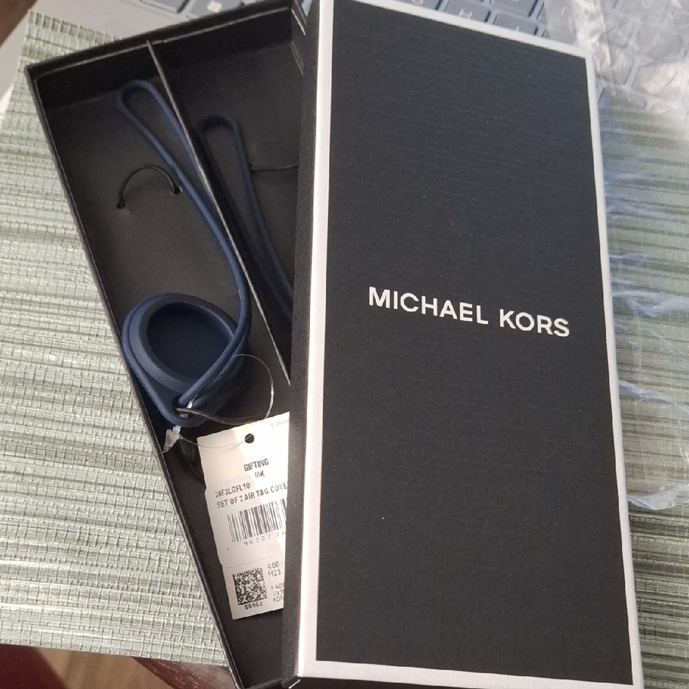 Michael Kors Navy Blue Air‎ Tag Covers $40